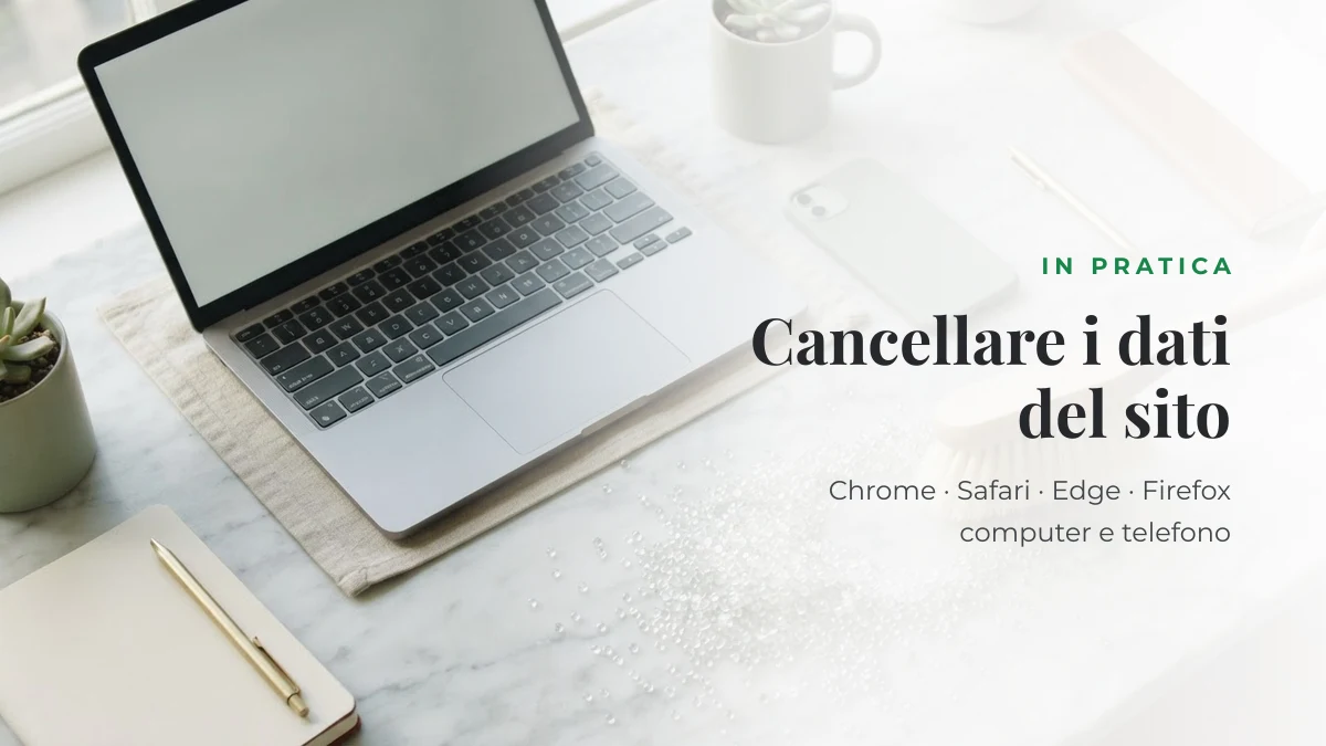 Scrivania con telefono e portatile e una spazzola che rimuove piccole sfere, a rappresentare la cancellazione dei dati del sito